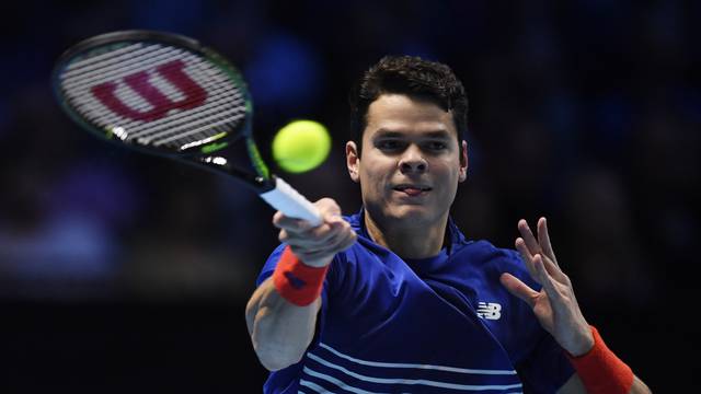 Canada's Milos Raonic in action during his round robin match with Austria's Dominic Thiem