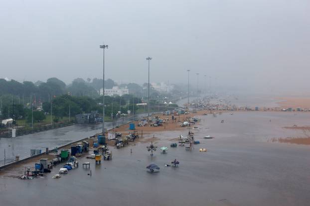 A deserted Marina beach is seen during rains before Cyclone Nivar