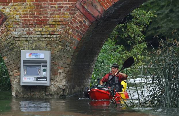 Art installation of an ATM cashpoint, attributed to anonymous artist Impro, on Sonning Bridge in Sonning