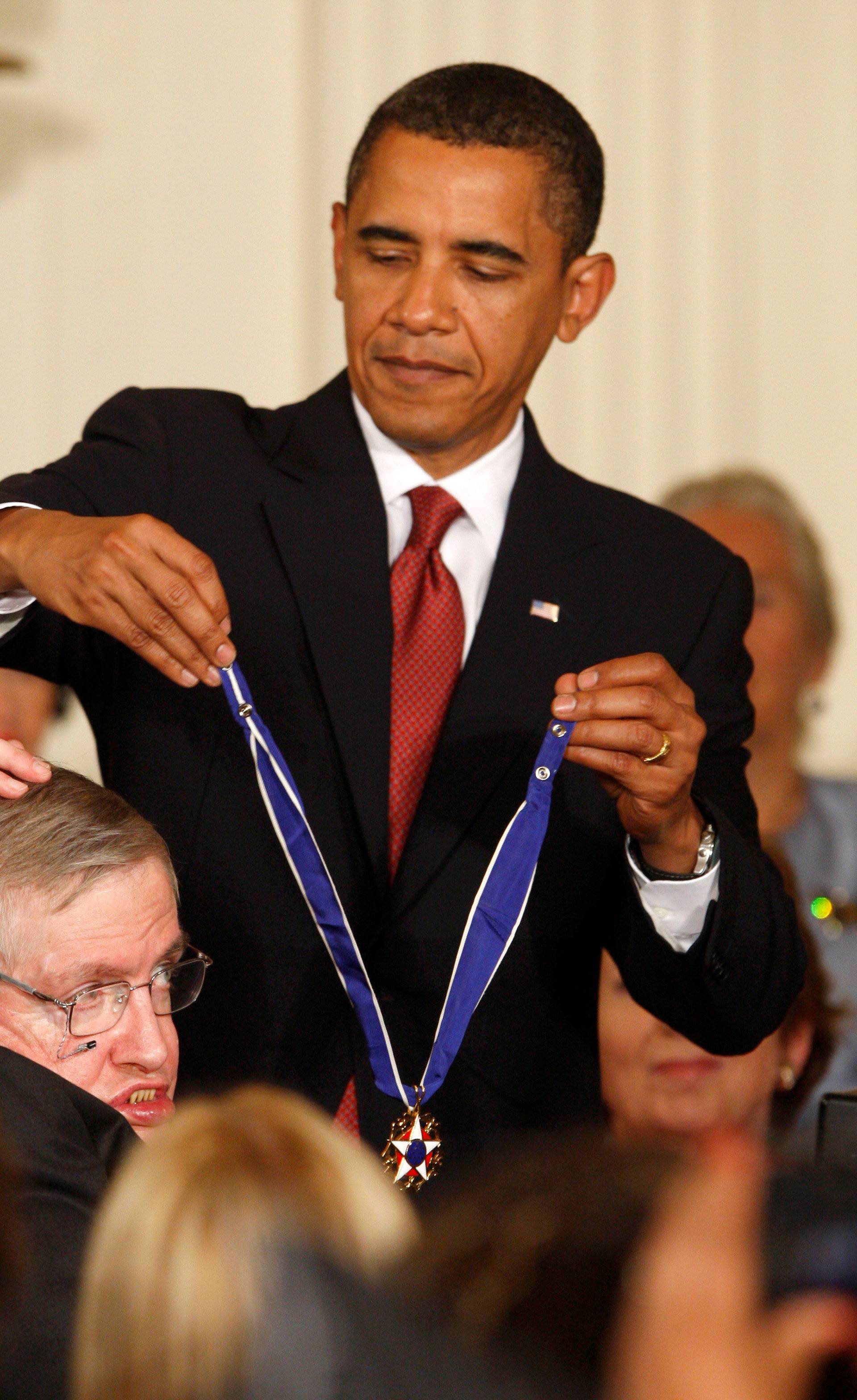 FILE PHOTO: U.S. President Obama presents the medal of freedom to Stephen Hawking in Washington
