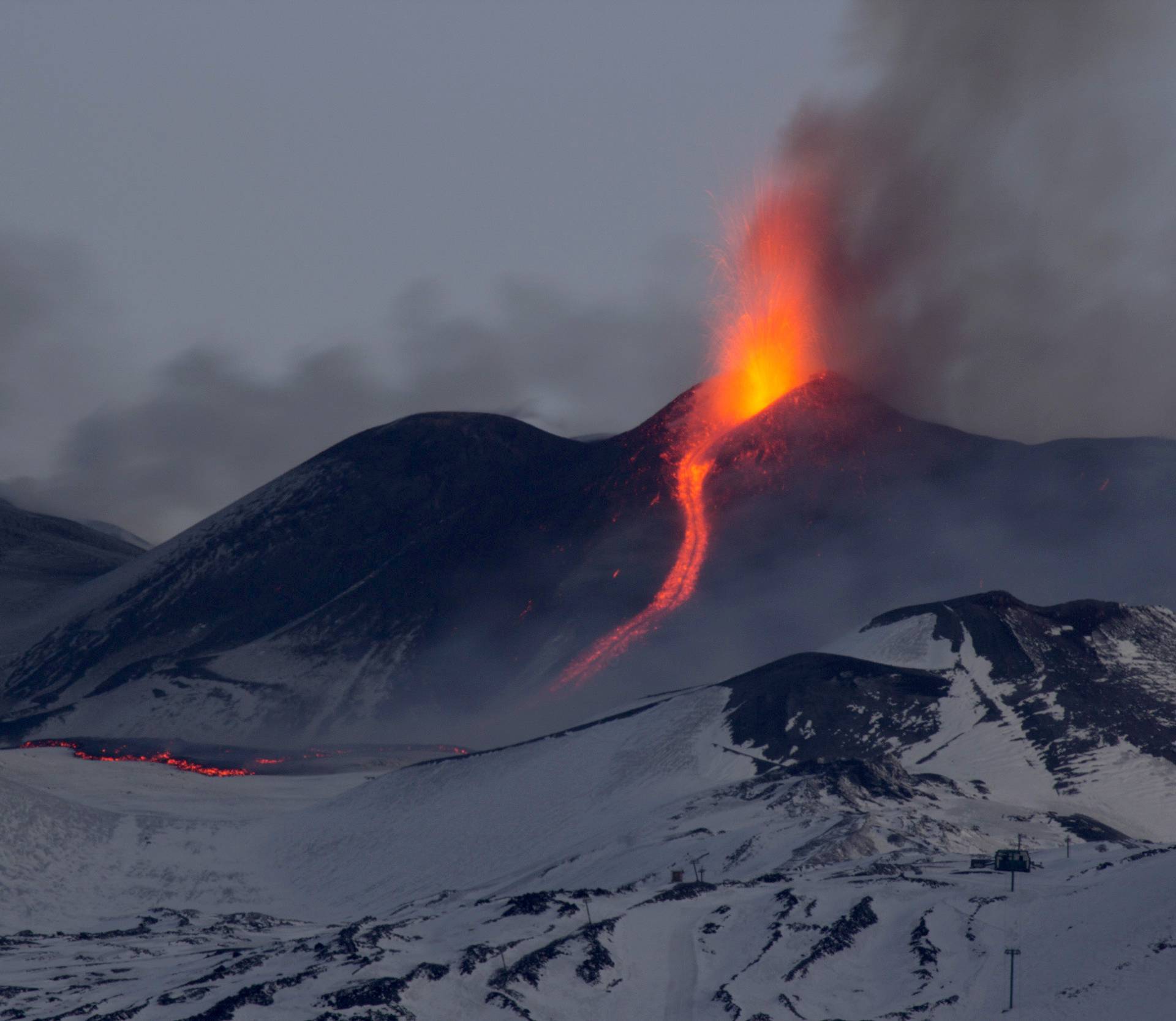 Nicolosi, Mount Etna erupting. The south east crater colors the nights of Catania