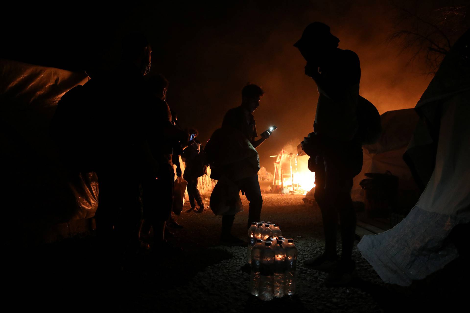 Fire burns at the Moria camp for refugees and migrants on the island of Lesbos