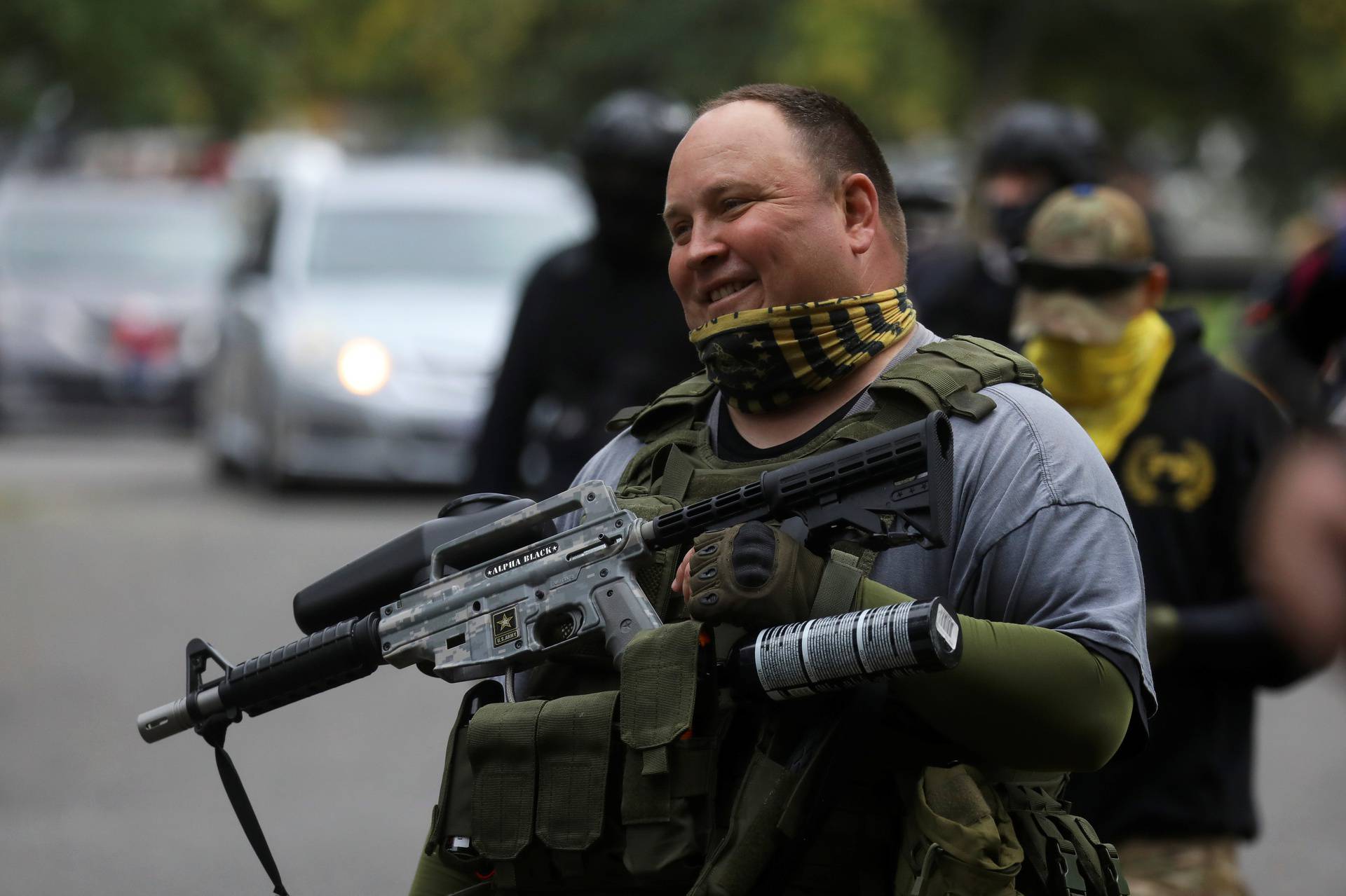 A supporter of the far right group Proud Boys reacts at a rally in Portland