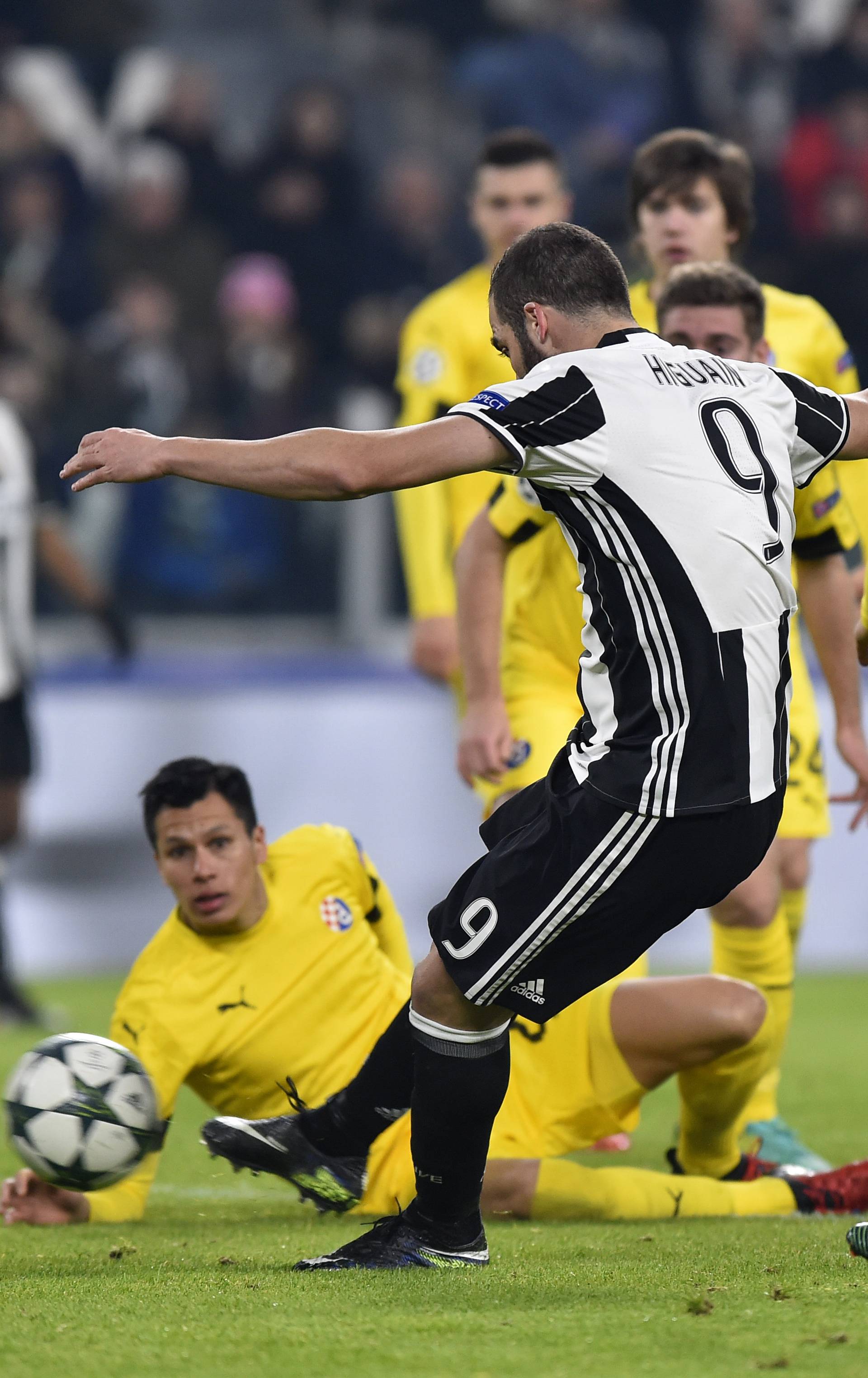 Juventus' Gonzalo Higuain scores their first goal