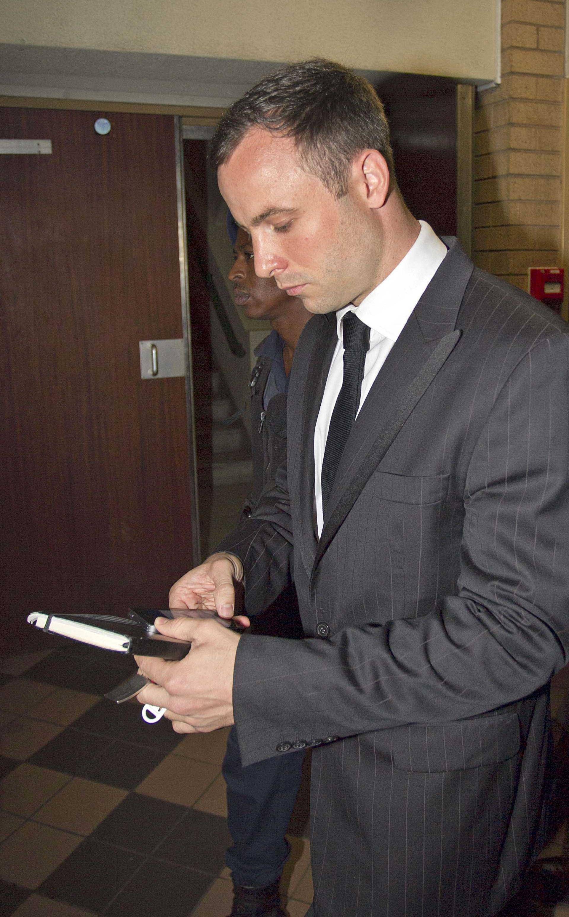 Oscar Pistorius arriving for sentencing at the High Court