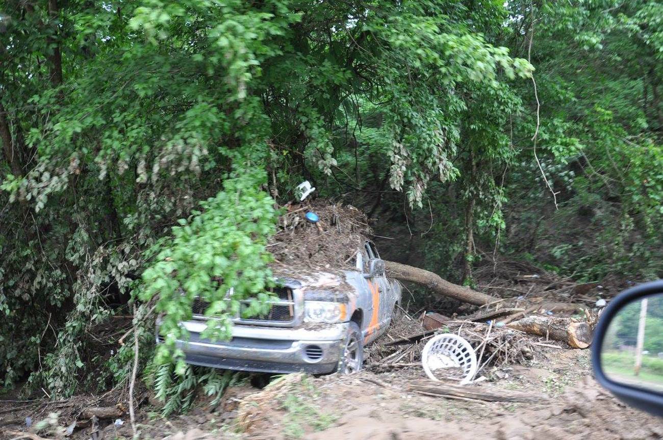 A damaged car is seen in Elkview