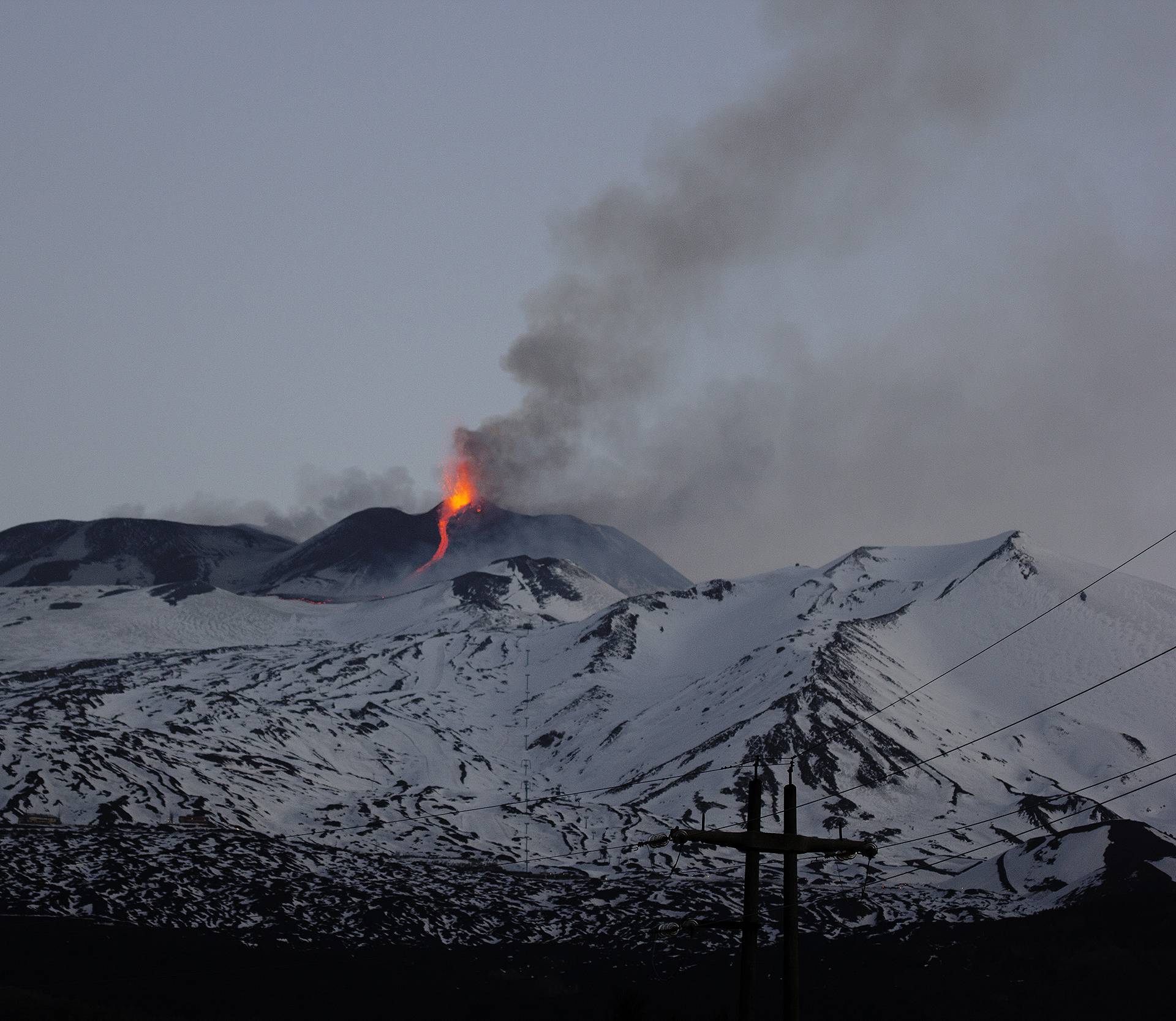 Nicolosi, Mount Etna erupting. The south east crater colors the nights of Catania