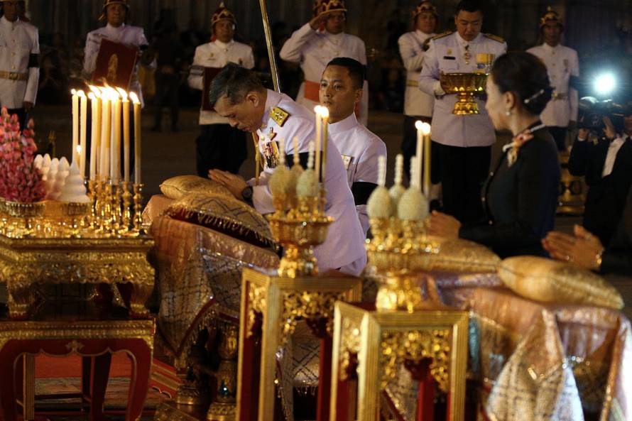 Thailand's Crown Prince Maha Vajiralongkorn attends an event commemorating the death of King Chulalongkorn, known as King Rama V, as he joins people during the mourning of his father, the late King Bhumibol Adulyadej, at the Royal Plaza in Bangkok