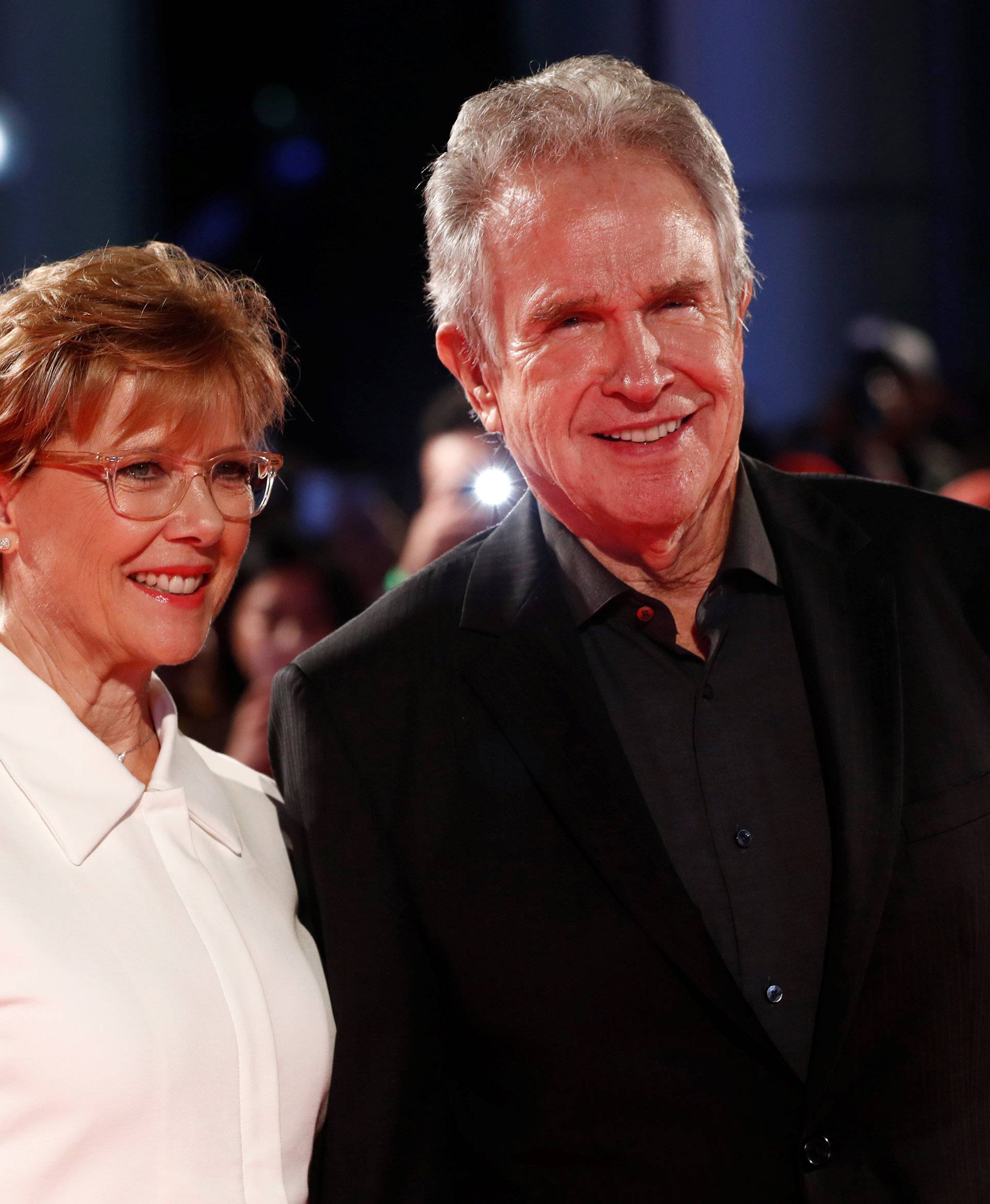 Bening arrives with her husband Beatty on the red carpet for the film "Film Stars Don't Die in Liverpool" during the Toronto International Film Festival in Toronto
