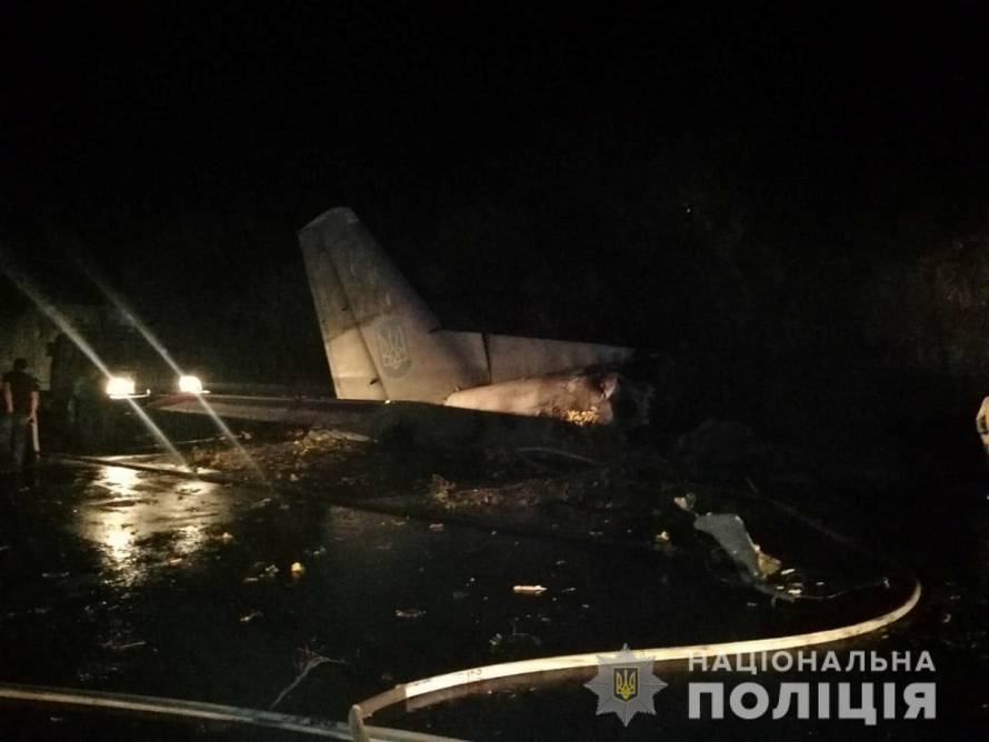 Wreckages of the Ukrainian military Antonov An-26 plane are seen at its crash site outside of Chuhuiv town