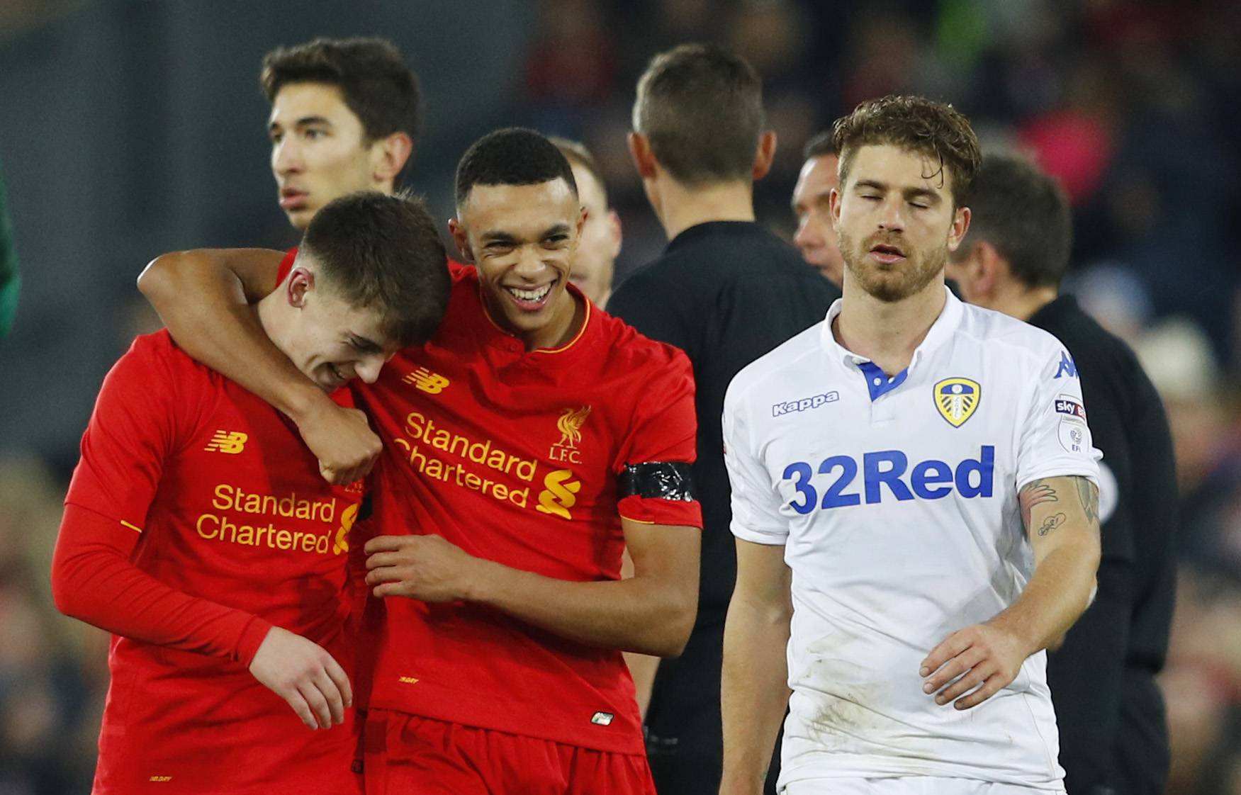 Liverpool's Ben Woodburn and Trent Alexander-Arnold celebrate after the game