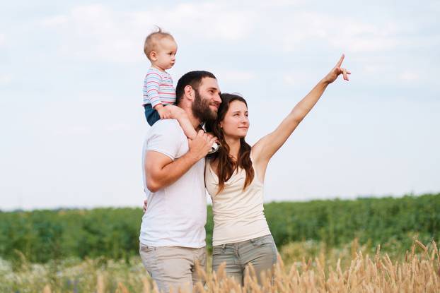 Parents,And,Son,Family,Portrait.,Daddy,,Mom,And,Child,Having