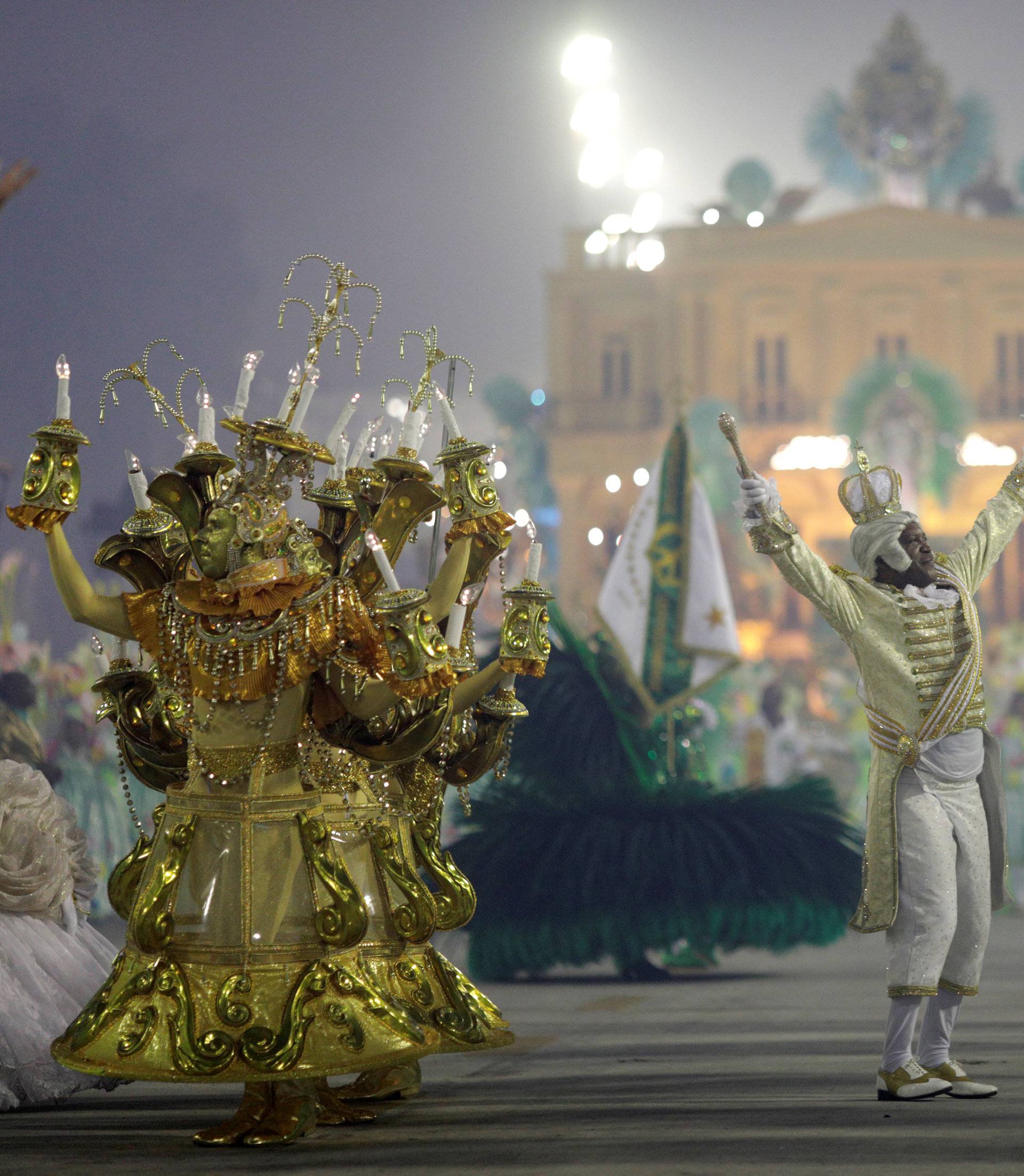 Revellers from Imperatriz samba school perform during the second night of the Carnival parade at the Sambadrome in Rio de Janeiro