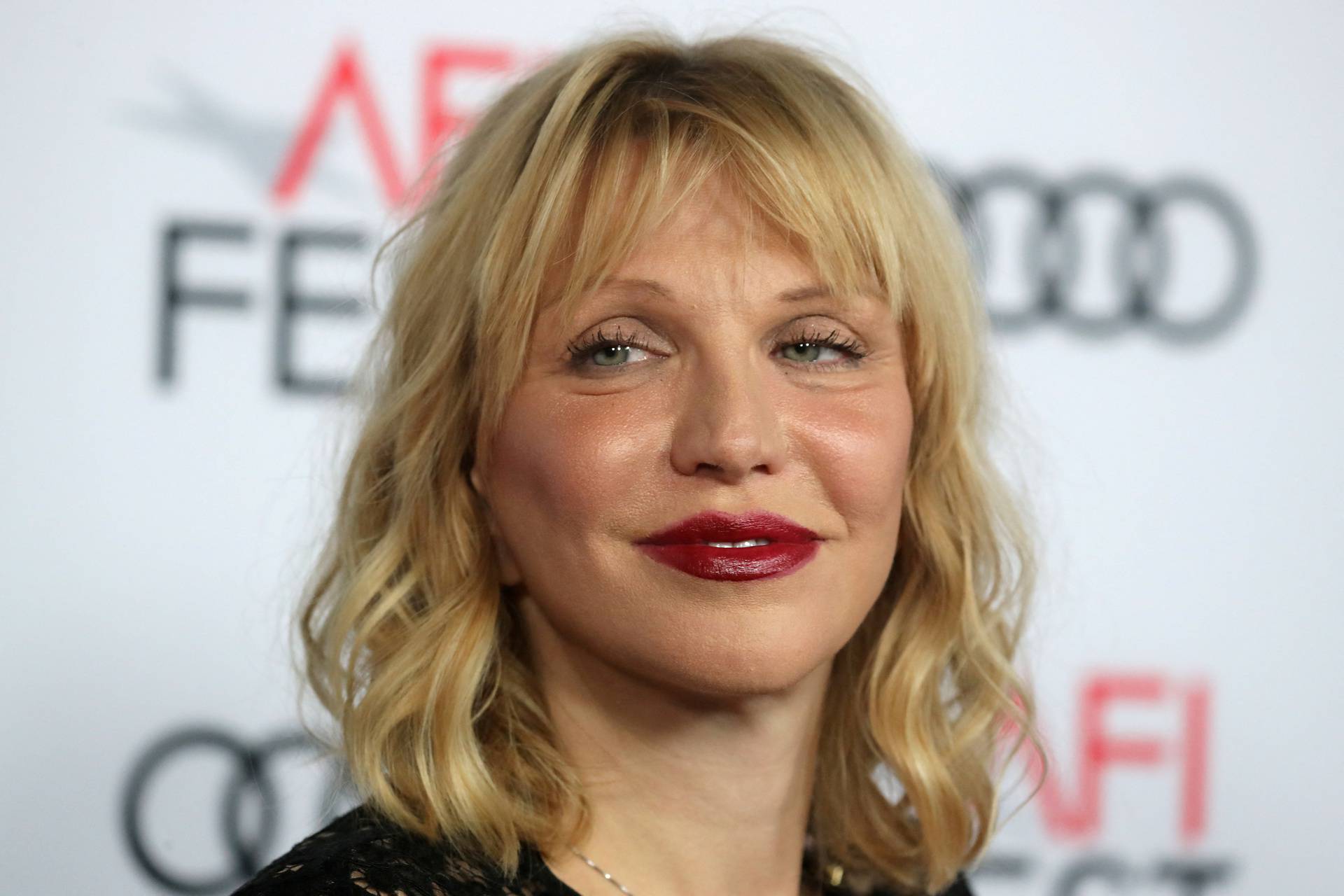FILE PHOTO: Courtney Love arrives for the gala presentation of "The Disaster Artist" at the AFI Film Festival in Los Angeles