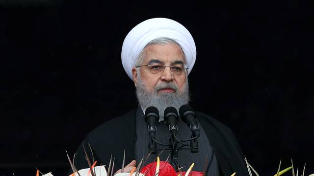 Iran's President Hassan Rouhani speaks during a ceremony to mark the 40th anniversary of the Islamic Revolution in Tehran