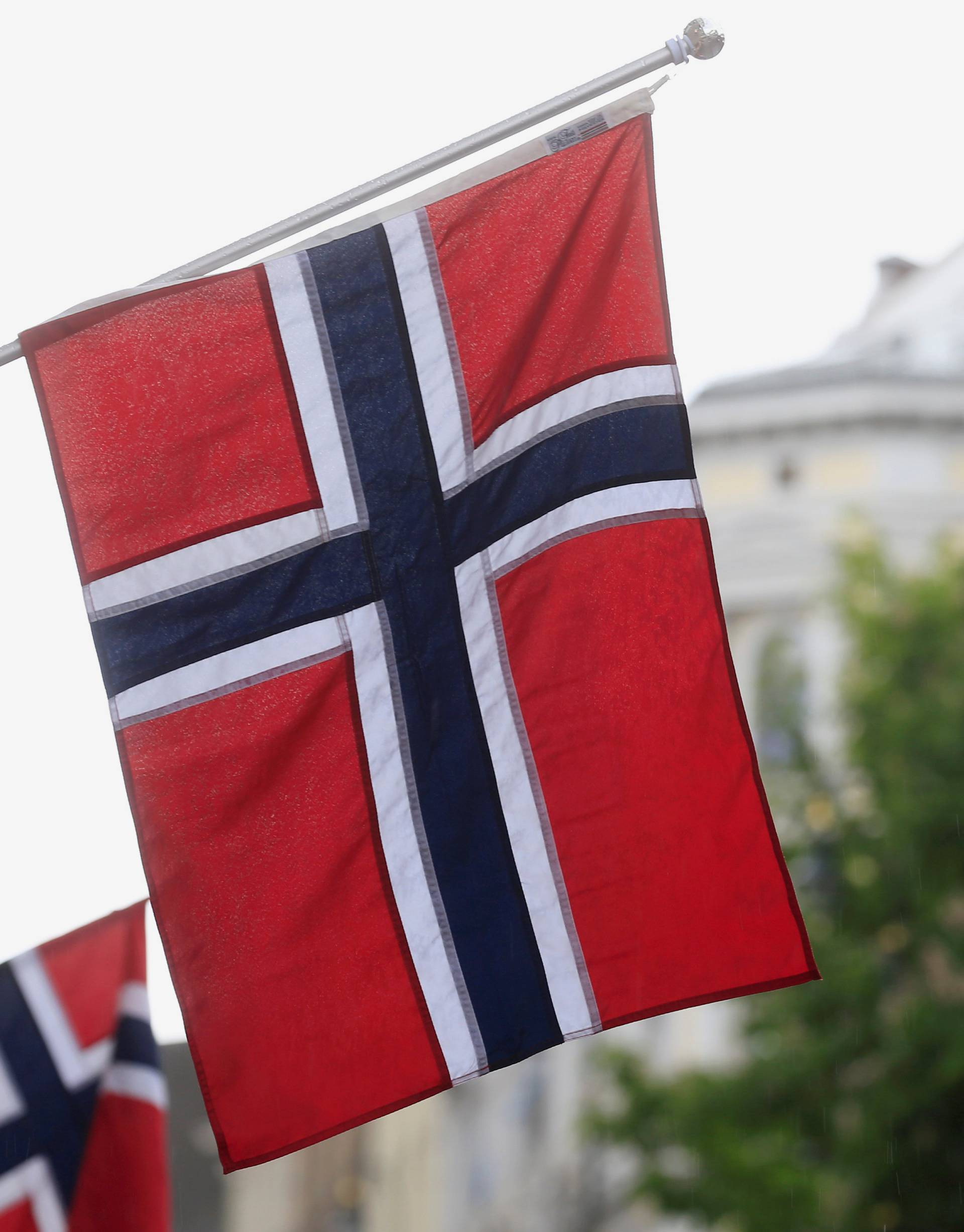 FILE PHOTO: Norwegian flags flutter at Karl Johans street in Oslo