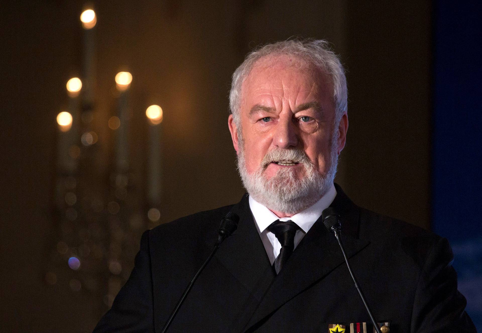 FILE PHOTO: Actor Bernard Hill speaks during a news conference in Hong Kong