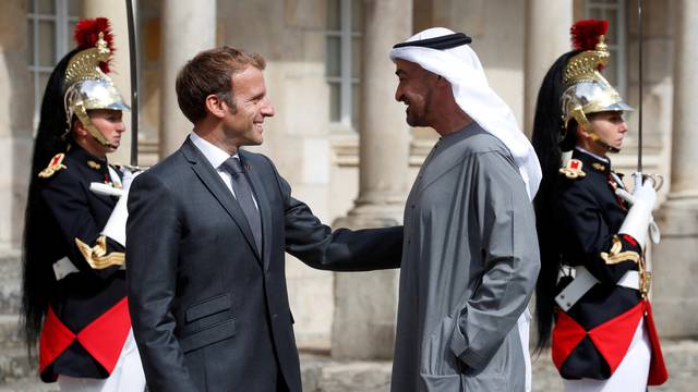 FILE PHOTO: French President Emmanuel Macron meets Abu Dhabi's Crown Prince Sheikh Mohammed bin Zayed al-Nahyan in Fontainebleau