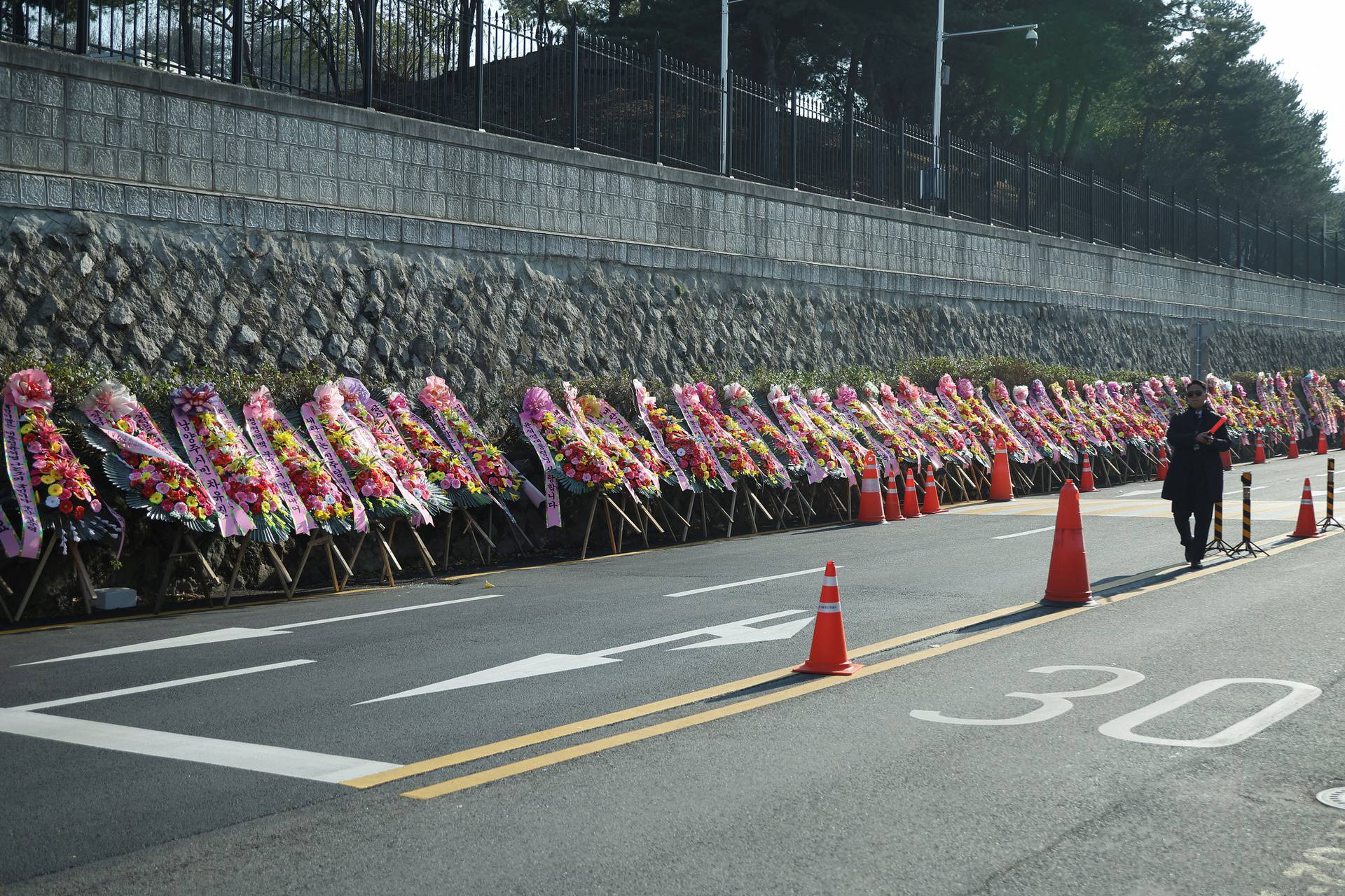 Police from the national office of investigation raid the Presidential Office, in Seoul