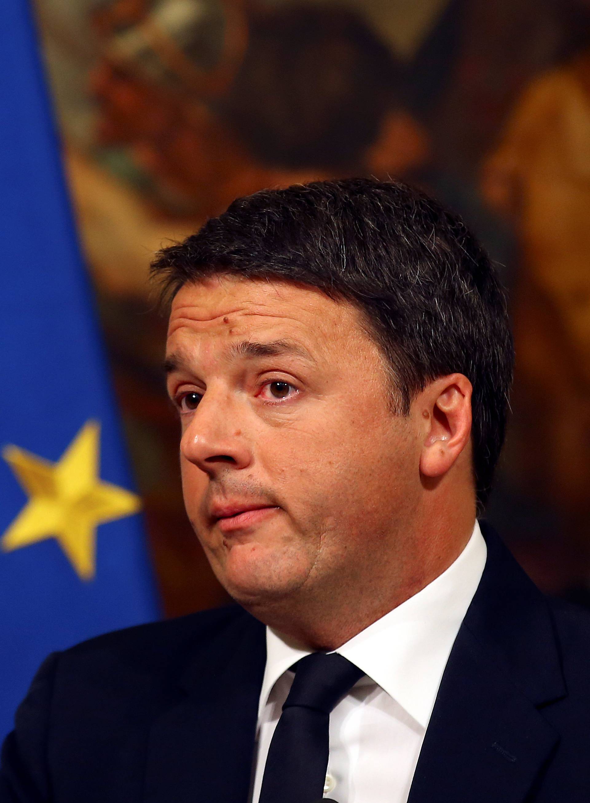 Italian Prime Minister Matteo Renzi looks on during a media conference after a referendum on constitutional reform at Chigi palace in Rome