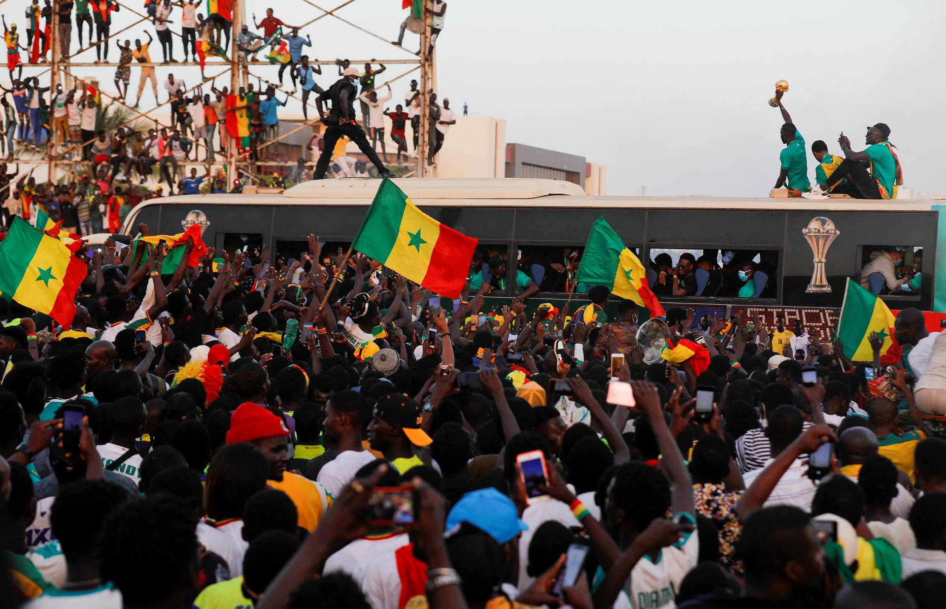 Senegal fans celebrate and welcome the Senegal National Soccer Team after their Africa Cup win, in Dakar