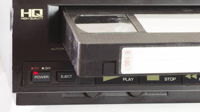 Old,Vhs,Video,Cassettes,And,Old,Video,Recorder.,Closeup.