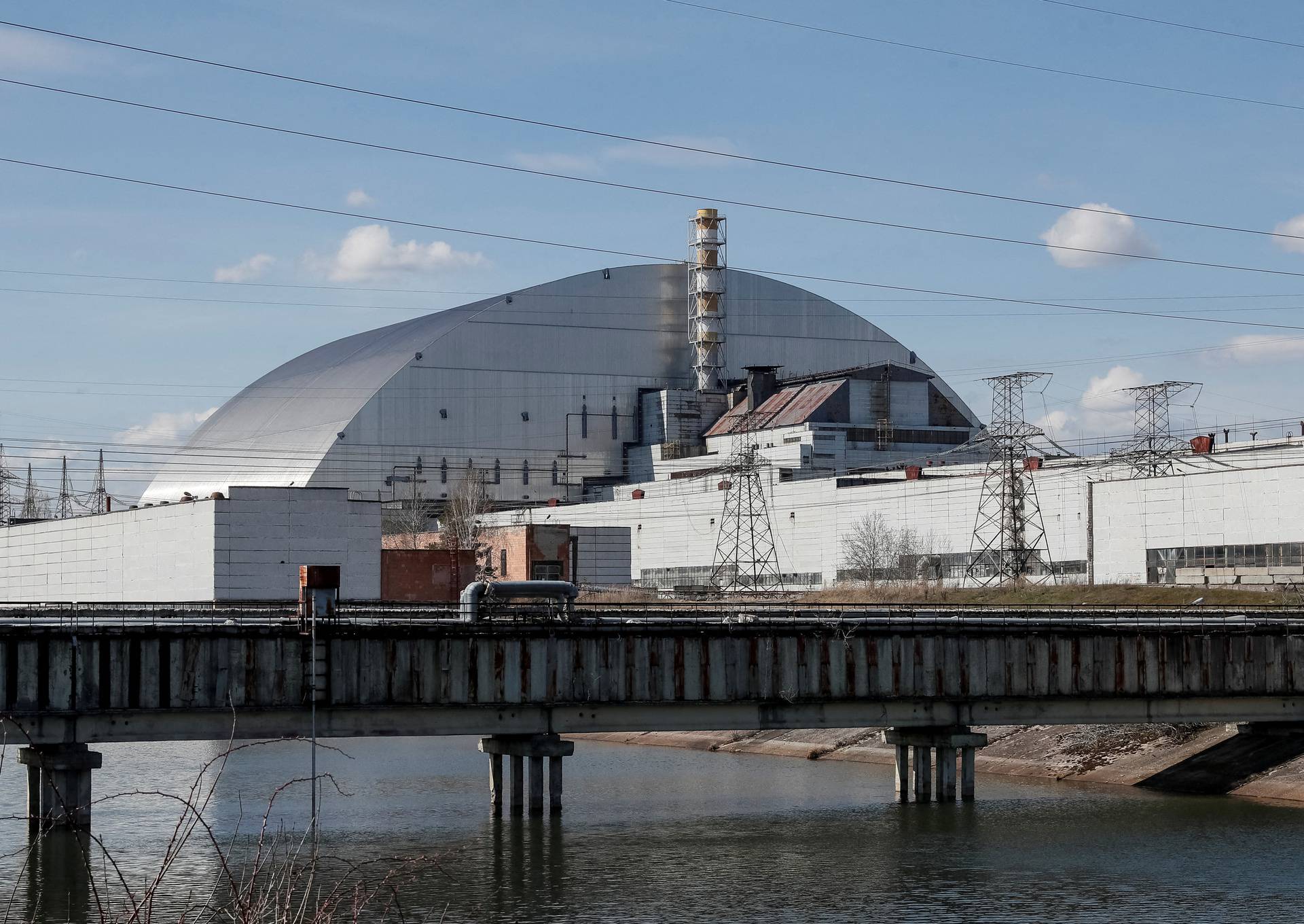 General view of the New Safe Confinement structure over the old sarcophagus covering the damaged fourth reactor at the Chernobyl Nuclear Power Plant, in Chernobyl