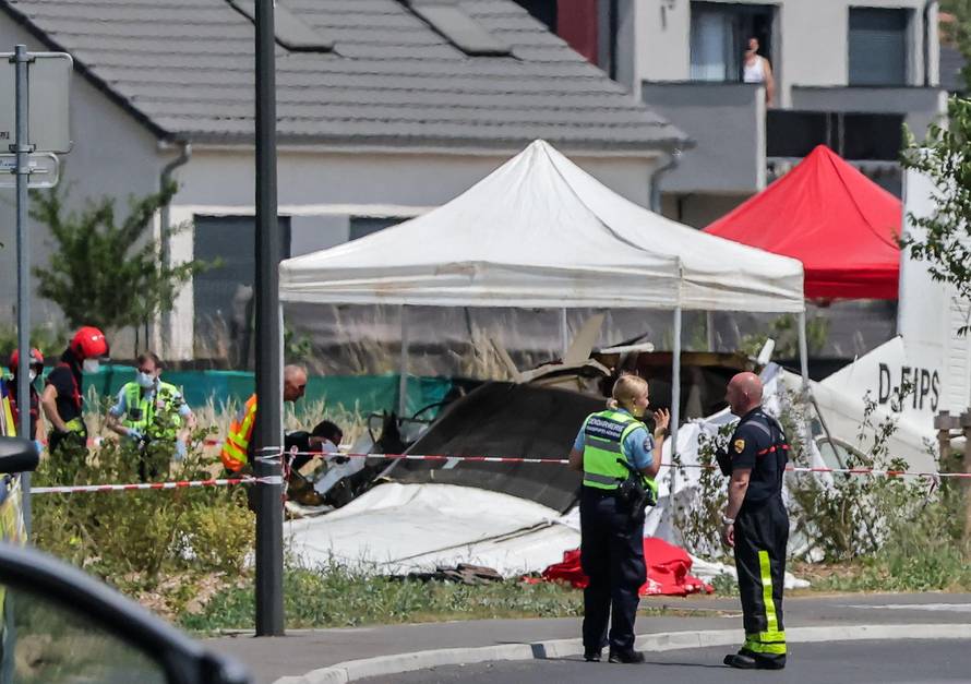 French rescuers work at the site of a plane crash, in Tomblaine