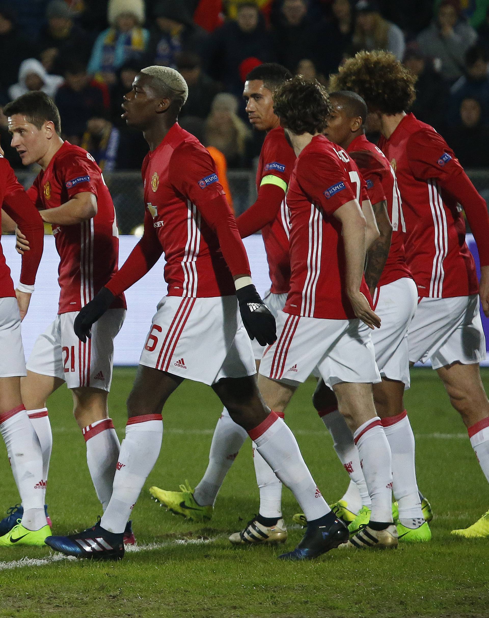 Manchester United's Henrikh Mkhitaryan celebrates scoring their first goal with team mates