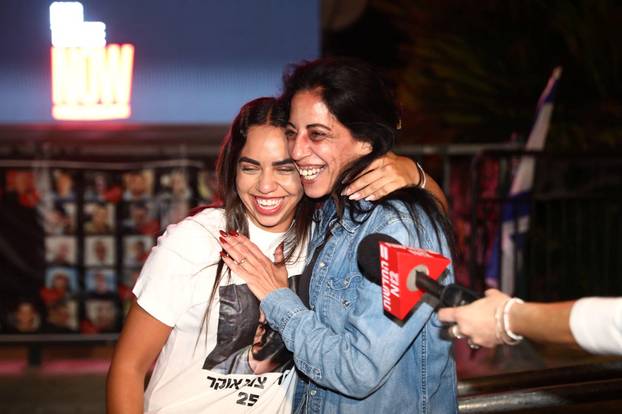 Natali Zangauker, sister of Israeli hostage Matan Zangauker and their mother Einav Zangauker, celebrate after U.S. President Donald Trump announced that Israel and Hamas agreed on the first phase of a Gaza ceasefire, in Tel Aviv