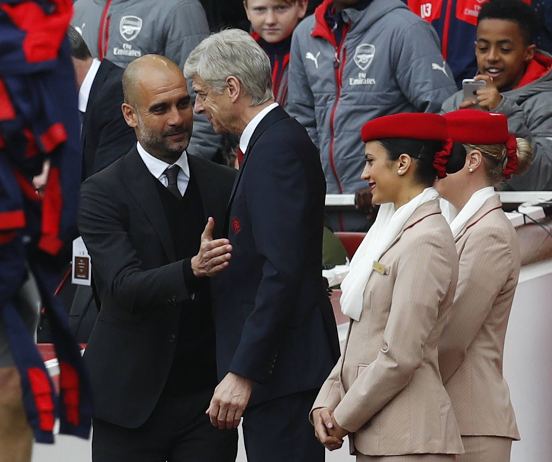 Manchester City manager Pep Guardiola and Arsenal manager Arsene Wenger