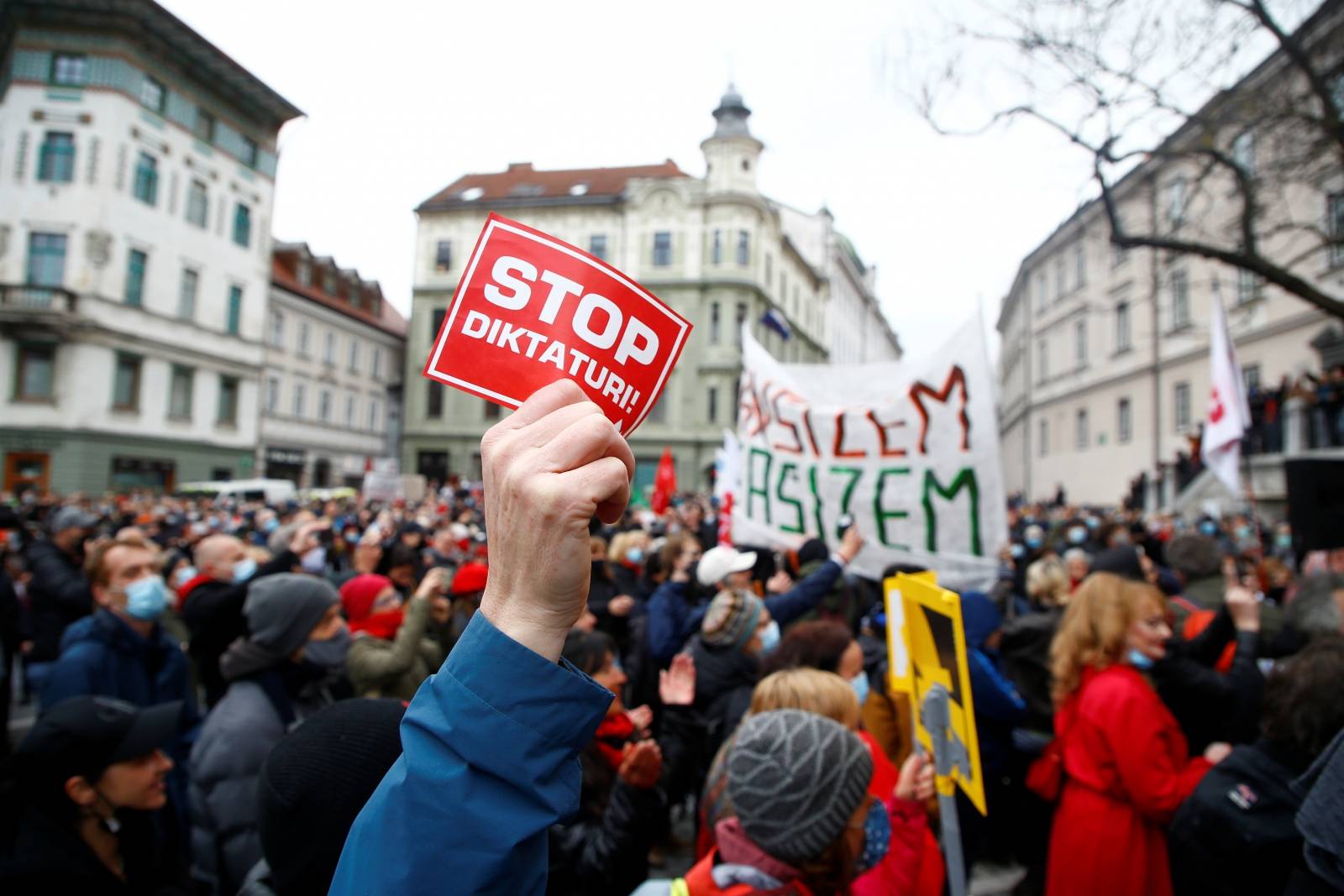 Demonstrators attend an anti-government protest in Ljubljana