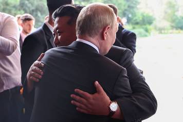 Russian President Vladimir Putin meets with North Korean leader Kim Jong Un in Beijing