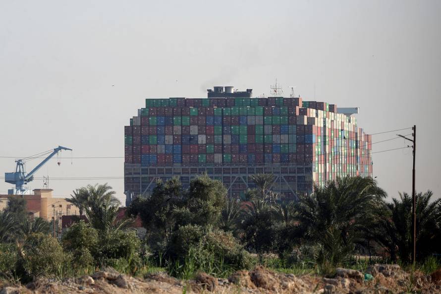 Stranded container ship Ever Given is seen after it ran aground in Suez Canal