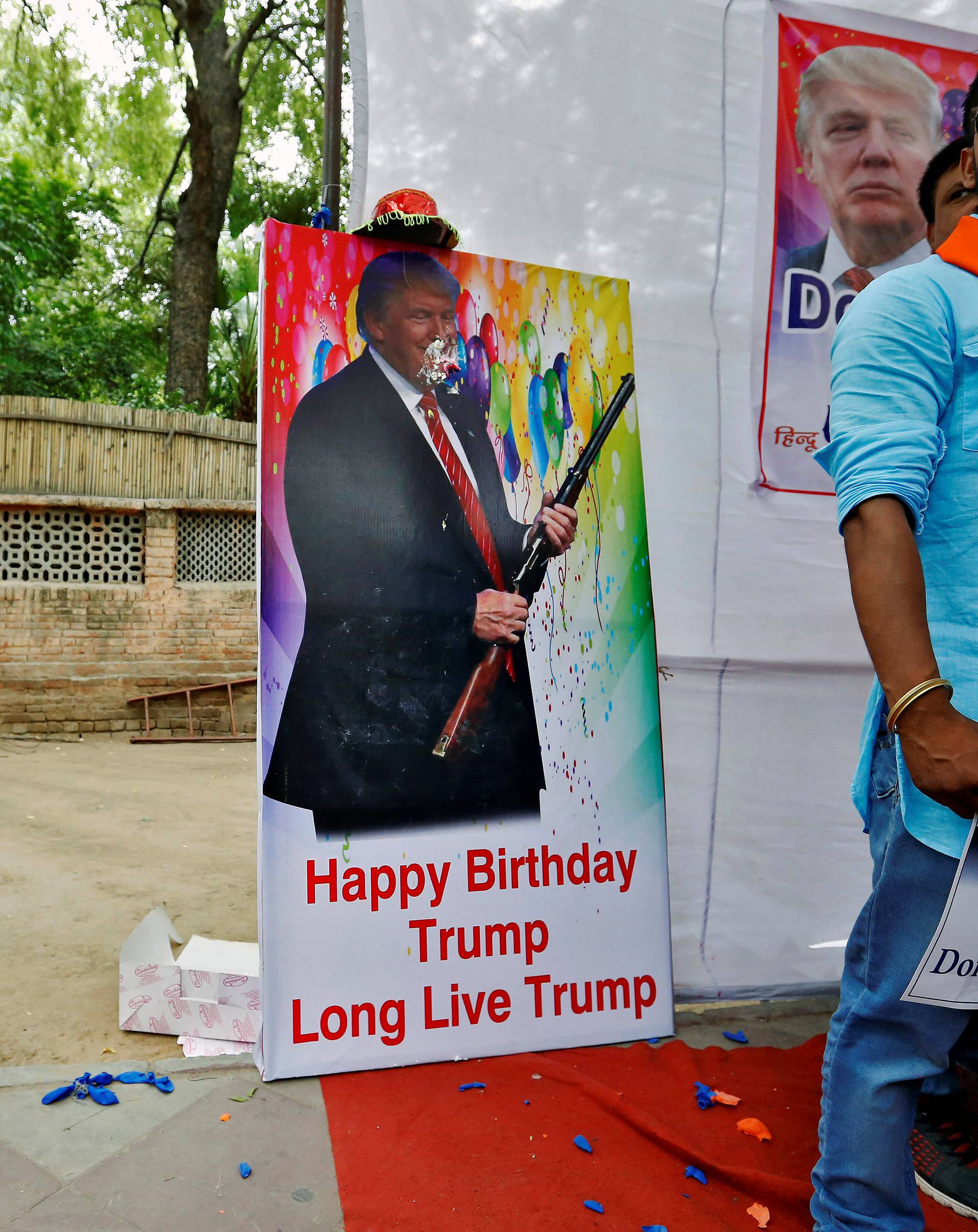 Members of Hindu Sena, a right wing Hindu group, celebrate U.S. Republican presidential candidate Trump's birthday in New Delhi