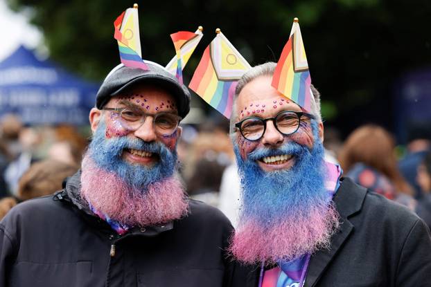 People pose outside the venue ahead of the Grand Final of the 2026 Eurovision Song Contest in Vienna