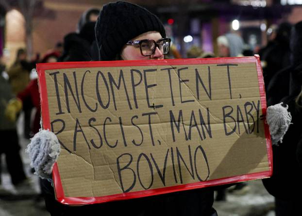 Protest outside the hotel where Bovino, who has been removed from his role, is reportedly staying, in Maple Grove
