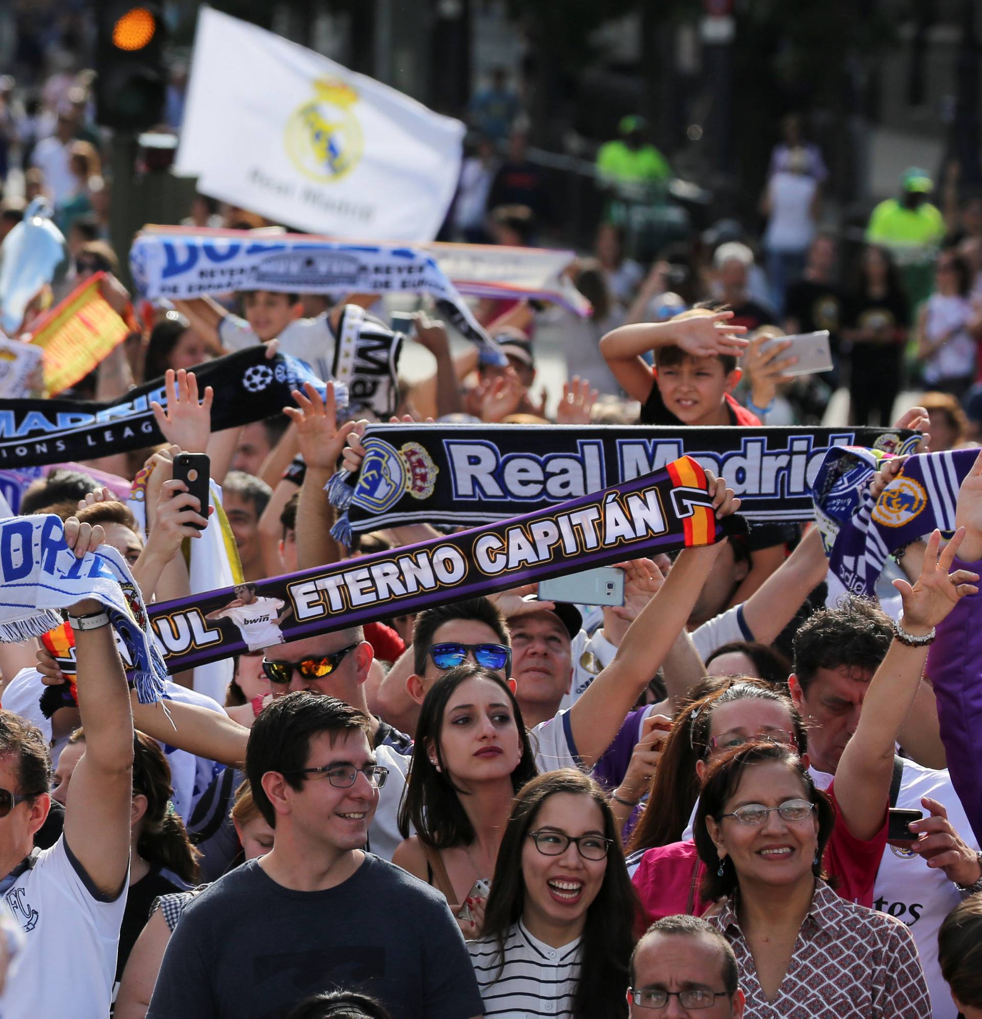 Real Madrid's fans celebrate Champions League title at Cibeles square as they wait the arrival of the team