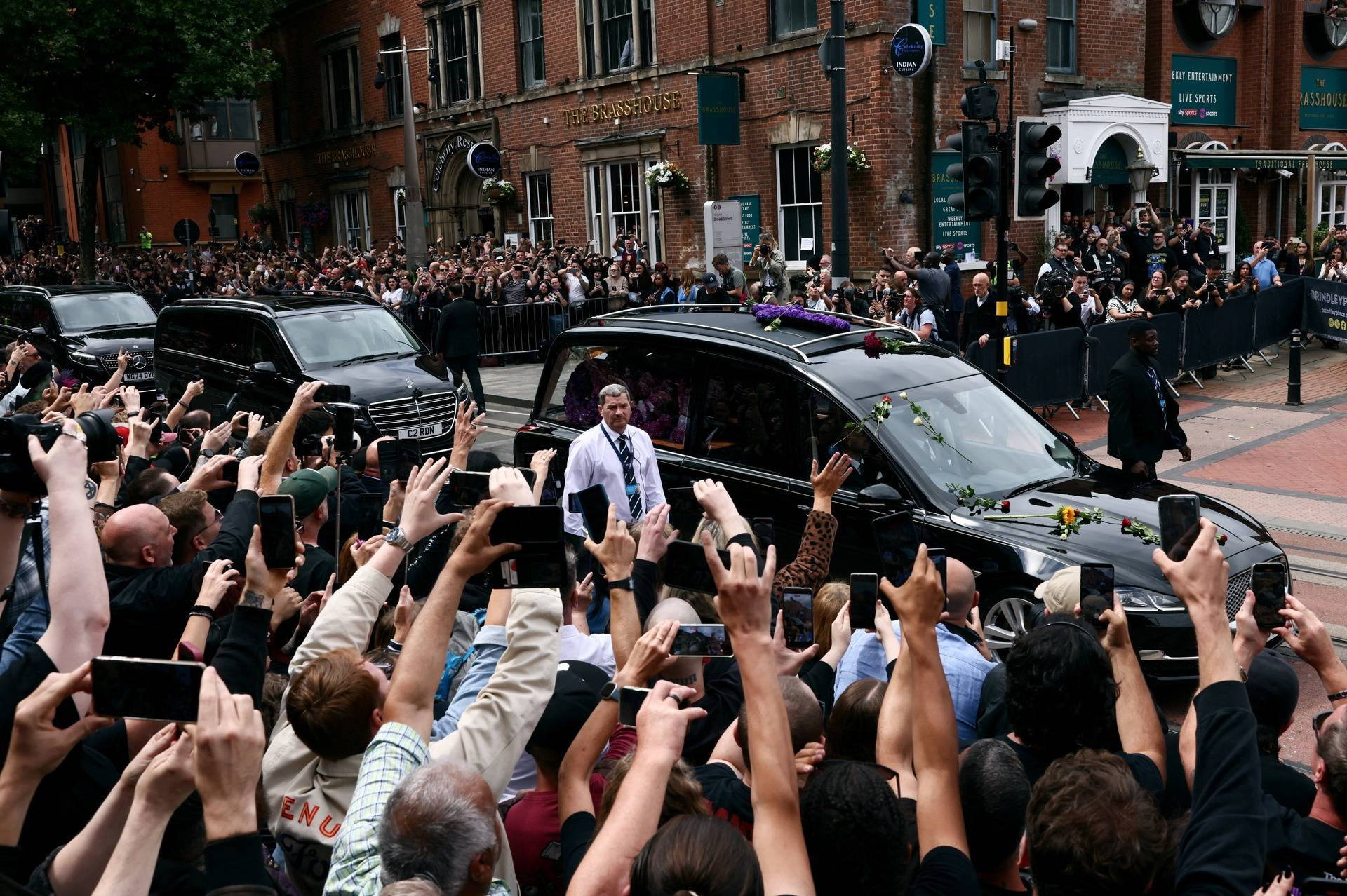 Ozzy Osbourne's funeral cortege travels through Birmingham