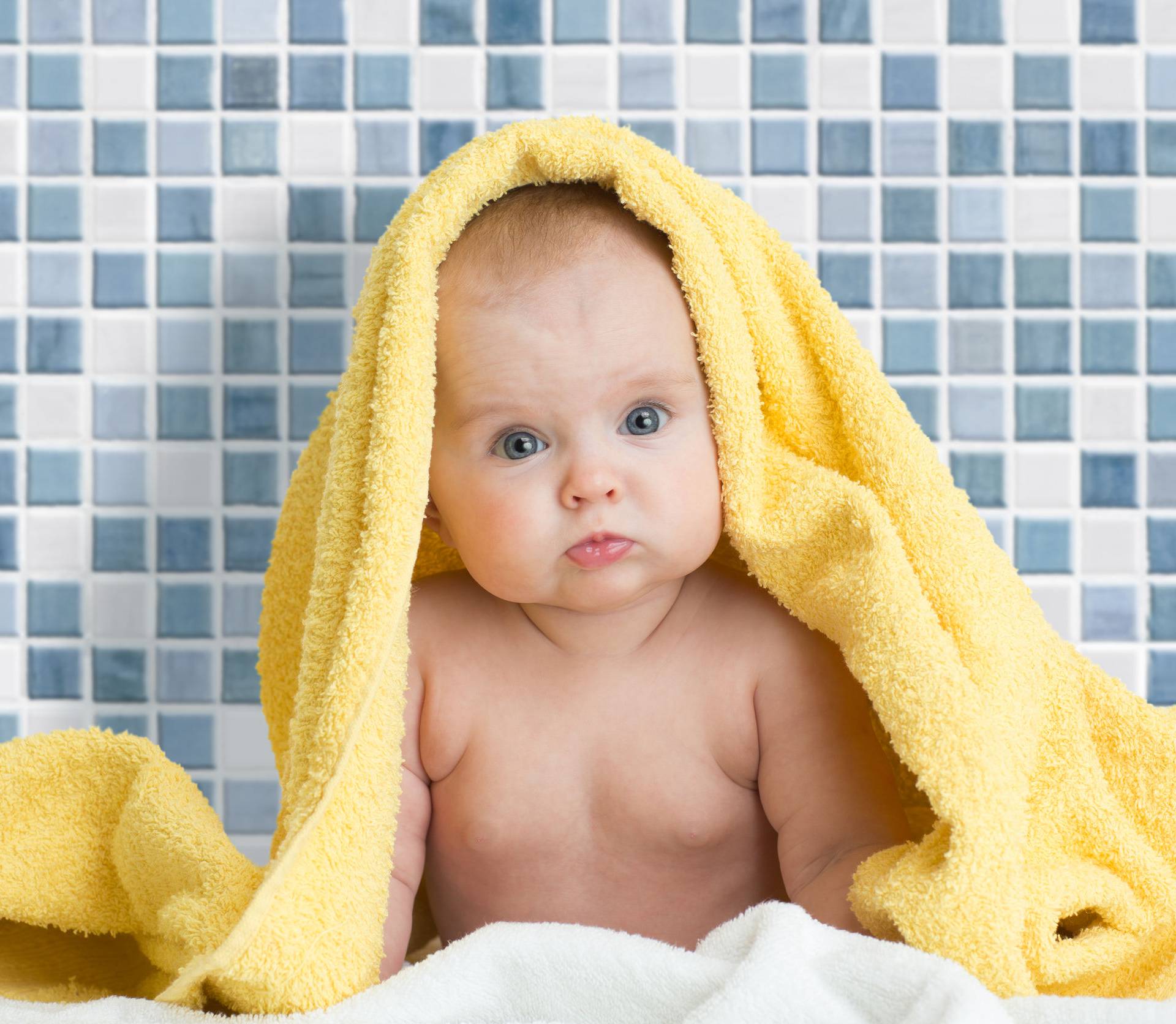 Cute baby in bath towel