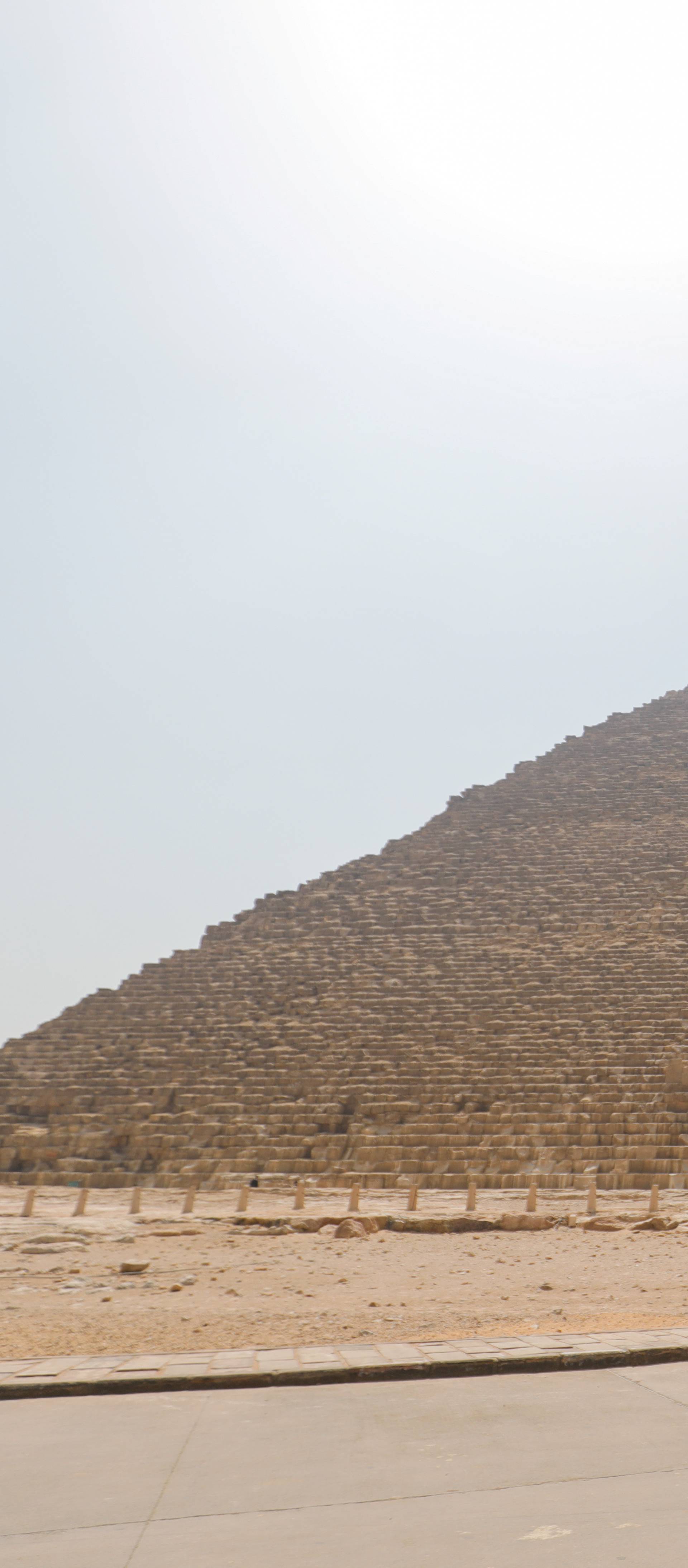 A police car is parked near the Great Pyramids, Giza, on the outskirts of Cairo, as the coronavirus disease (COVID-19) outbreak continues