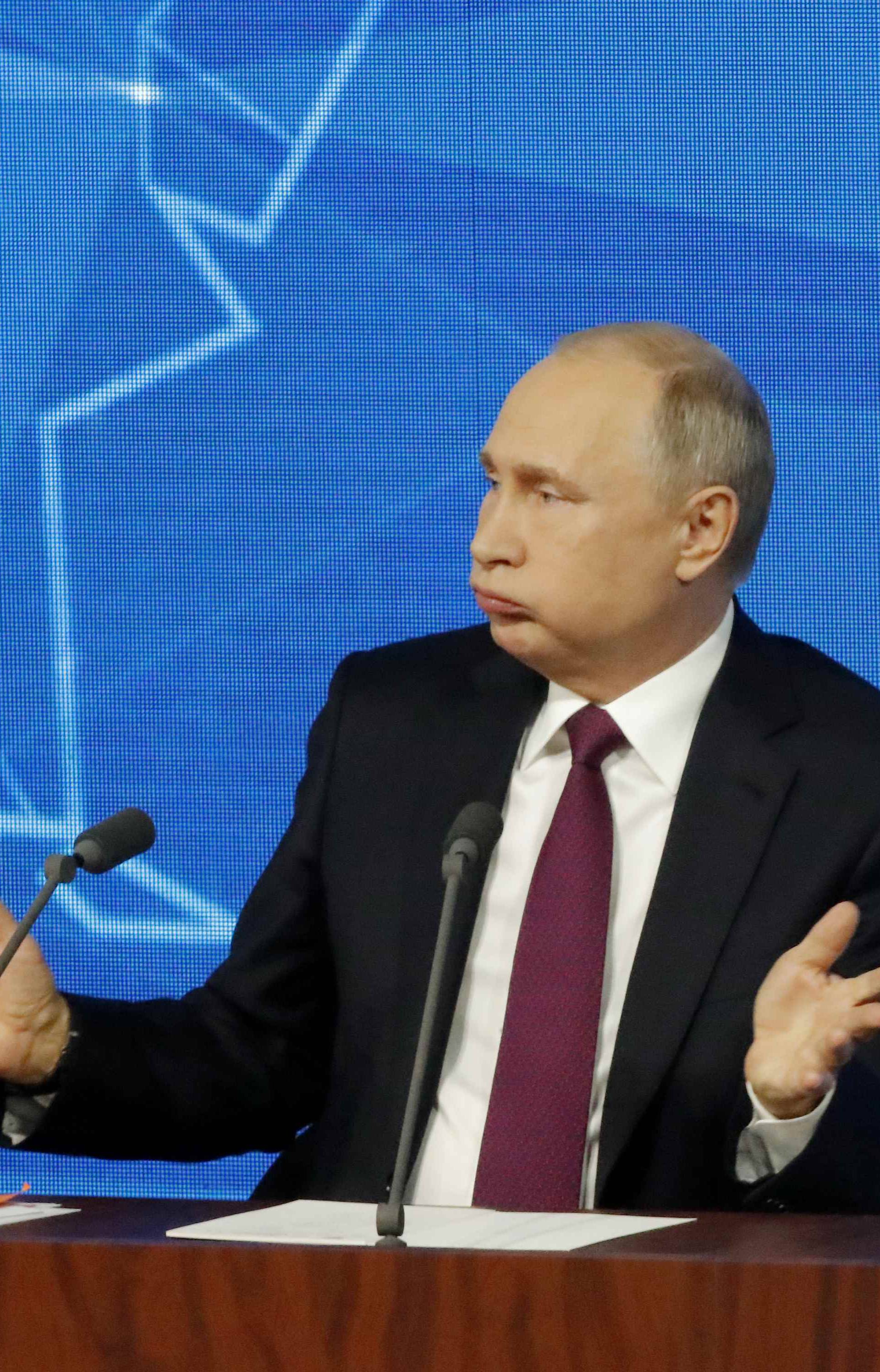 Russian President Putin speaks during annual news conference in Moscow