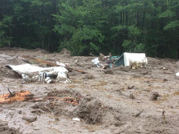 Damage done by a landslide is seen in Villa Santa Lucia