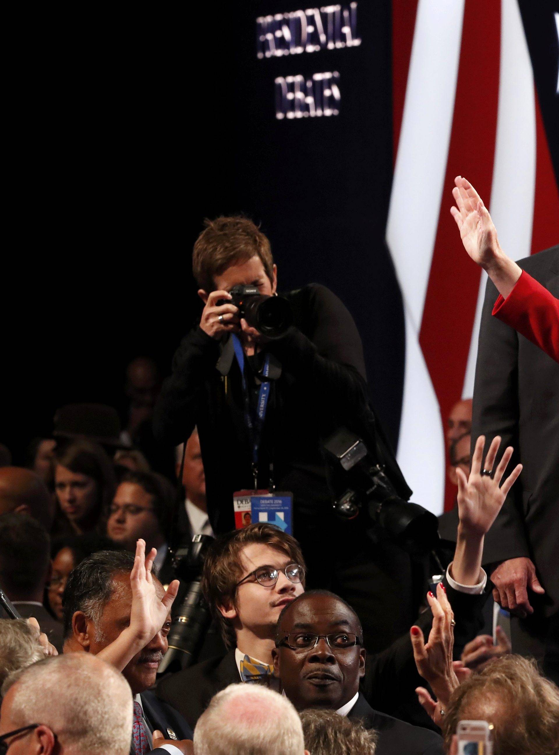 Democratic U.S. presidential nominee Hillary Clinton and her husband former President Bill Clinton greet attendees after the conclusion the first debate with Republican U.S. presidential nominee Donald Trump at Hofstra University in Hempstead