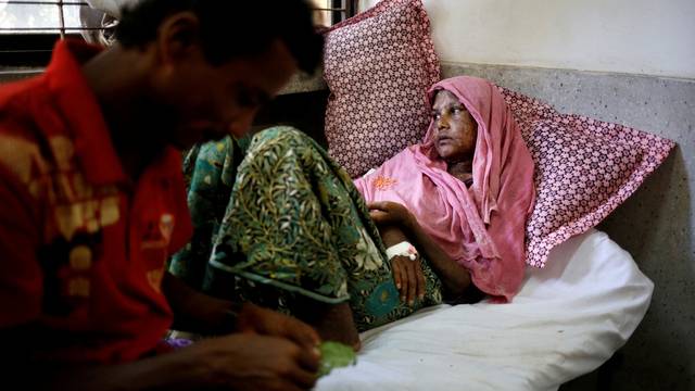 FILE PHOTO: A Rohingya refugee receives treatment at the Cox's Bazar District Sadar Hospital in Cox's Bazar