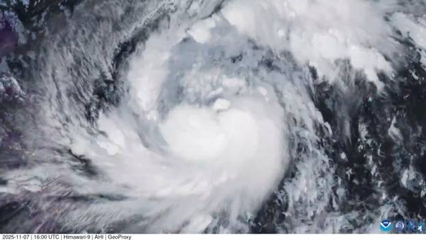 A satellite image shows Storm Fung-Wong, which has intensified into a typhoon
