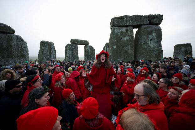 Winter solstice celebrations during sunrise at Stonehenge