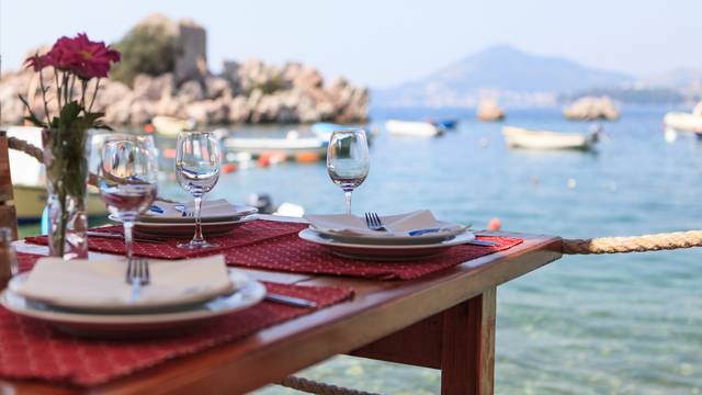 Served,Table,In,Restaurant,On,Sea,Background