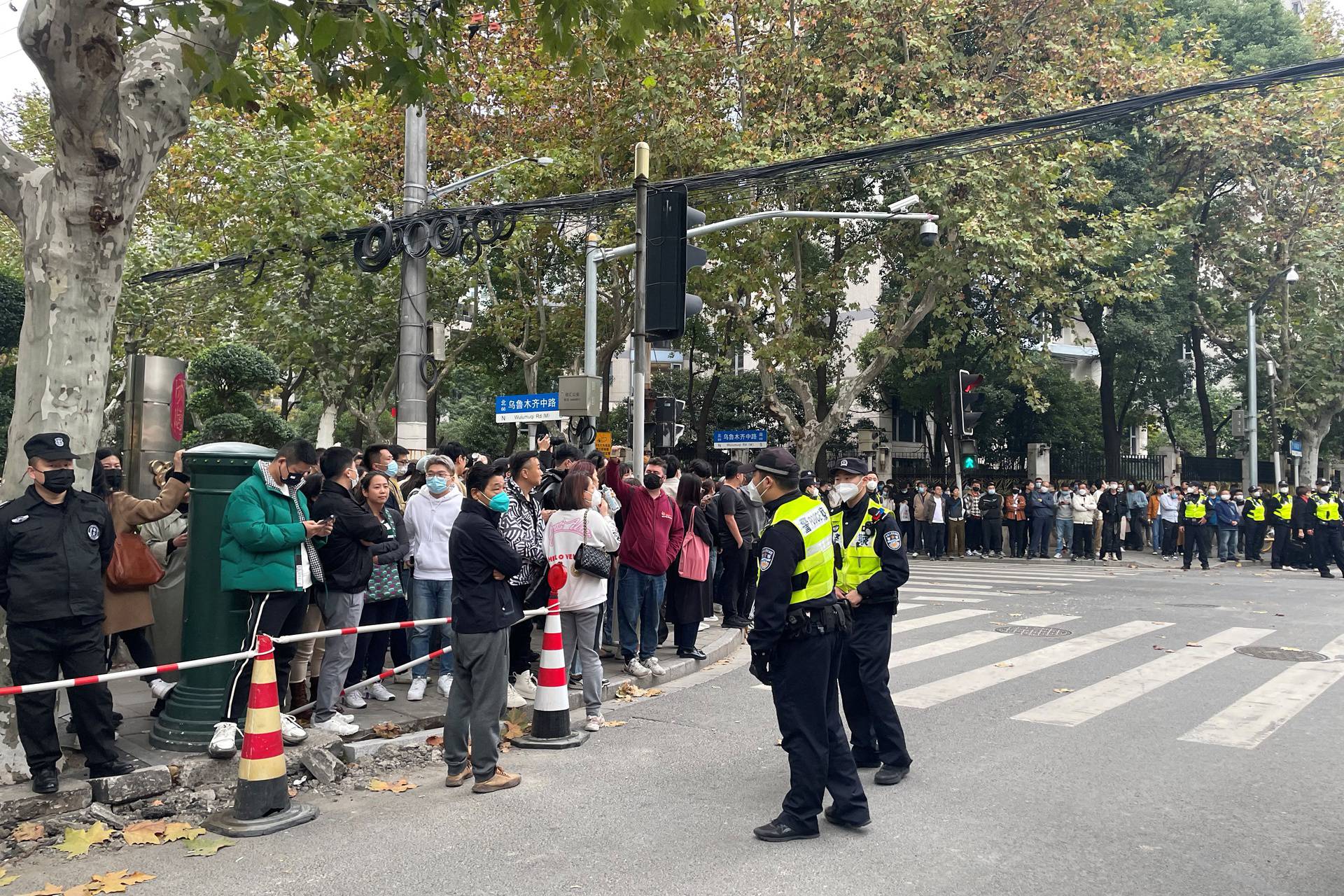 Police officers keep watch in Shanghai