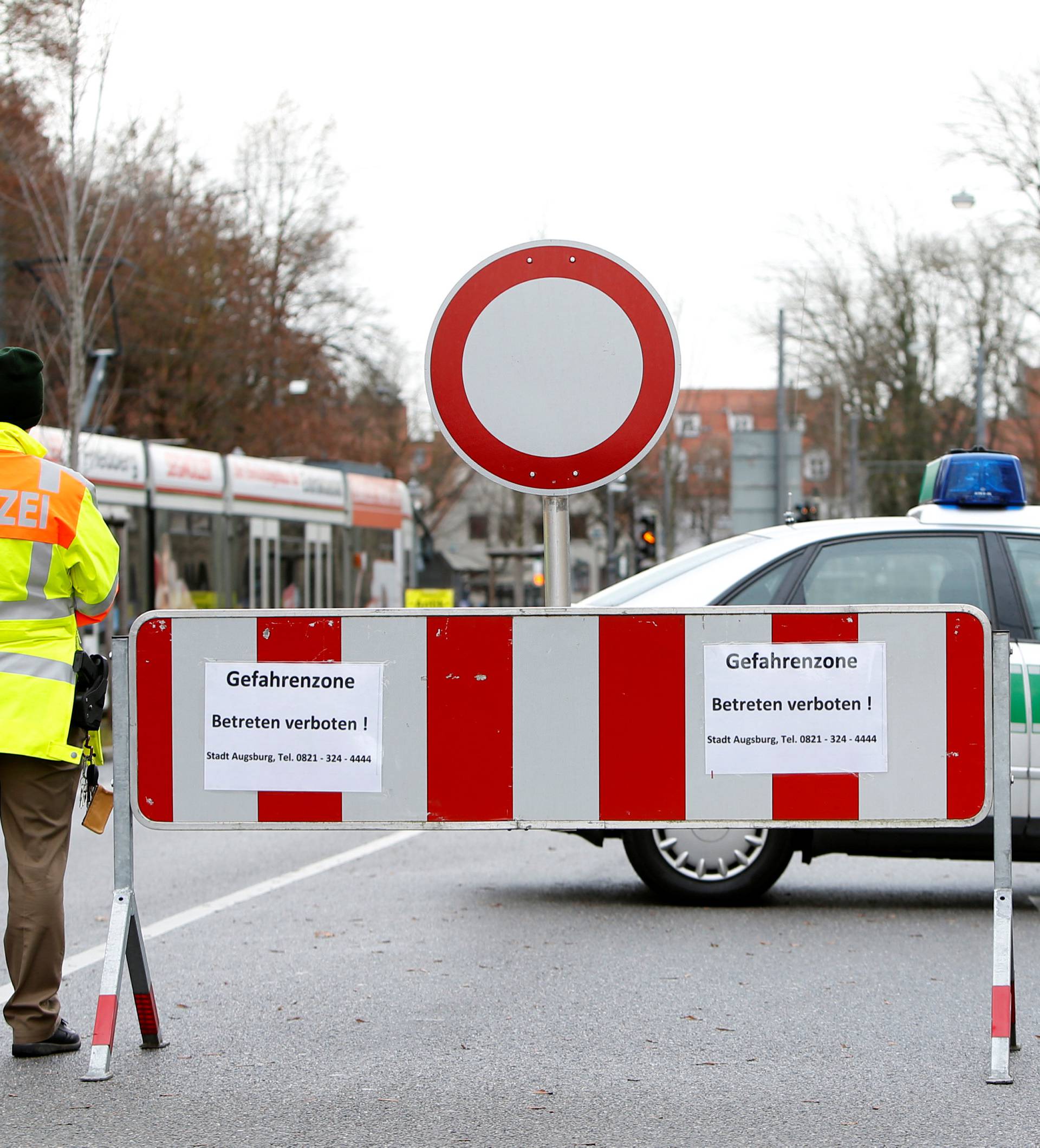 German police secure street after downtown was evacuated in Augsburg